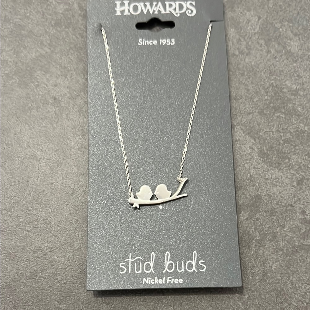 Silver Elegance Necklace with Intricate Bird Design